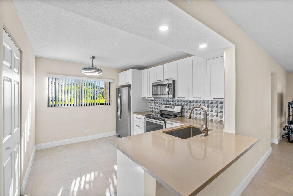 Photo of 15235 Lakes Of Delray Boulevard #283, Delray Beach, FL 33484 (MLS # R10947102)