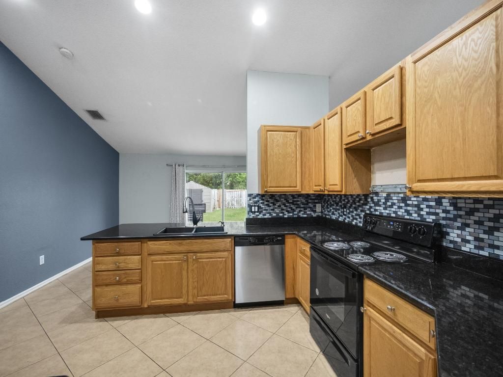 Photo of 1036 SW Di Lido Lane, Port Saint Lucie, FL 34953 (MLS # R10913804)