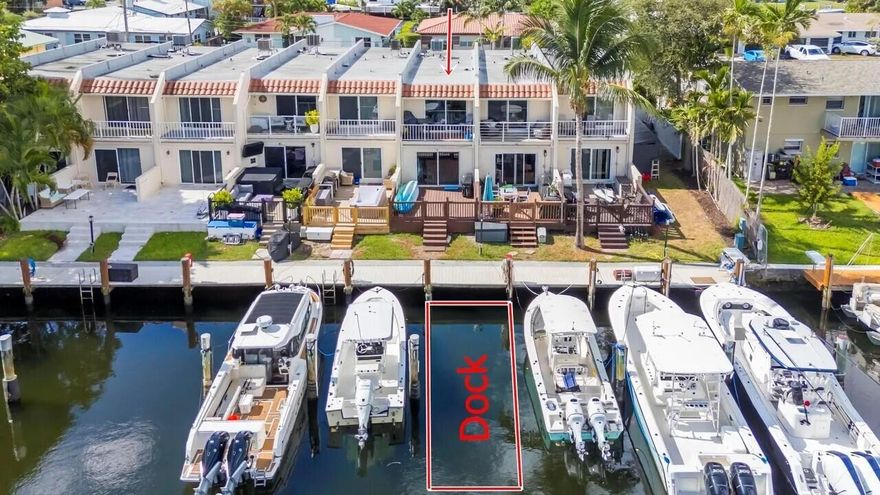 STUNNING WATERFRONT TOWNHOUSE WITH PRIVATE DOCK. This beautiful furnished 2BR/2.5BA gem in the SEAFAN community is a boater's dream. Featuring an assigned dock capable of accommodating up to a 36ft boat, you are just minutes from the Intracoastal and Hillsboro Inlet. The interior boasts a modern kitchen, stainless steel appliances and decorated in neutral tones with relaxed coastal feel. Enjoy canal views from your private wood patio or the primary suite's balcony. Property includes water. Ideally located 1 mile from the beach and Pompano's vibrant dining and pier district. Move-in ready and perfect for a stylish coastal lifestyle!