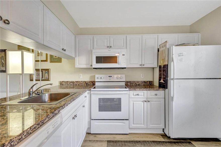 BEAUTIFUL 1st FL. ONE BEDROOM CONDO WITH A WONDERFUL WATER & GOLF VIEW.  IF YOU WANT TO LIVE THE WYNMOOR LIFESTYLE THIS IS A PERFECT WAY TO DO IT AT A REASONABLE PRICE. SPACIOUS CONDO HAS A DELIGHTFULLY UPDATED KITCHEN & BATHROOM WITH GRANITE COUNTERTOPS, NEWER CABINETS, FLAT CEILING & SPACIOUS PASSTHROUGH.  GORGEOUS COLORFUL LAMINATE FLOORING THROUGHOUT THE CONDO. NO CARPETS! HUGH PATIO TO SIT ON WITH YOUR MORNING COFFEE OR SIPPING WINE AT SUNSET LOOKING AT YOUR BEAUTFUL LANDSCAPED AREA LEADING TO YOUR WATER VIEW.  SOME FURNITURE NEGOTIABLE. WYNMOOR BOASTS SO MANY AMENITIES LIKE A RESTAURANT ON SITE, GOLF, FREE BASIC CABLE TV, TENNIS, EXERCISE FACILITY, FREE BUSES, PICKLEBALL, BILLARDS, FREE DANCES WITH DJ'S, BAR-B-QUES, ARTS & CRAFTS WORKSHOPS & MUCH MORE. HAVE FUN IN THE WYNMOOR SUN. BEAUTIFUL 1st FL. ONE BEDROOM CONDO WITH A WONDERFUL WATER & GOLF VIEW.  IF YOU WANT TO LIVE THE WYNMOOR LIFESTYLE THIS IS A PERFECT WAY TO DO IT AT A REASONABLE PRICE. SPACIOUS CONDO HAS A DELIGHTFULLY UPDATED KITCHEN & BATHROOM WITH GRANITE COUNTERTOPS, NEWER CABINETS, FLAT CEILING & SPACIOUS PASSTHROUGH.  GORGEOUS COLORFUL LAMINATE FLOORING THROUGHOUT THE CONDO. NO CARPETS! HUGH PATIO TO SIT ON WITH YOUR MORNING COFFEE OR SIPPING WINE AT SUNSET LOOKING AT YOUR BEAUTFUL LANDSCAPED AREA LEADING TO YOUR WATER VIEW.  SOME FURNITURE NEGOTIABLE. WYNMOOR BOASTS SO MANY AMENITIES LIKE A RESTAURANT ON SITE, GOLF, FREE BASIC CABLE TV, TENNIS, EXERCISE FACILITY, FREE BUSES, PICKLEBALL, BILLARDS, FREE DANCES WITH DJ'S, BAR-B-QUES, ARTS & CRAFTS WORKSHOPS & MUCH MORE. HAVE FUN IN THE WYNMOOR SUN.