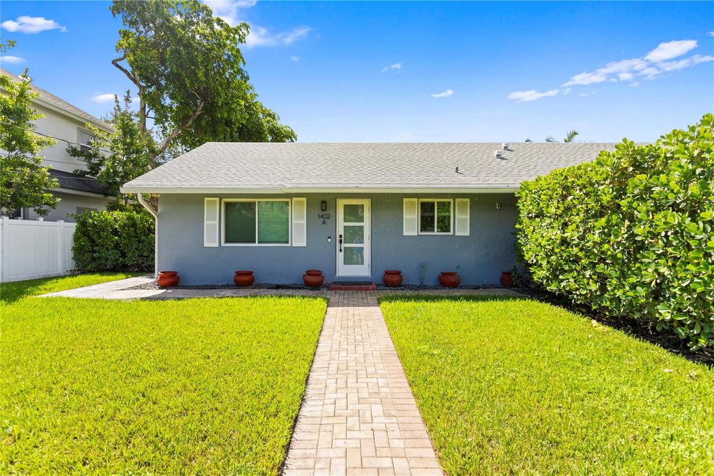 Photo of 1402 NE 34th Street, Oakland Park, FL 33334 (MLS # F10528734)
