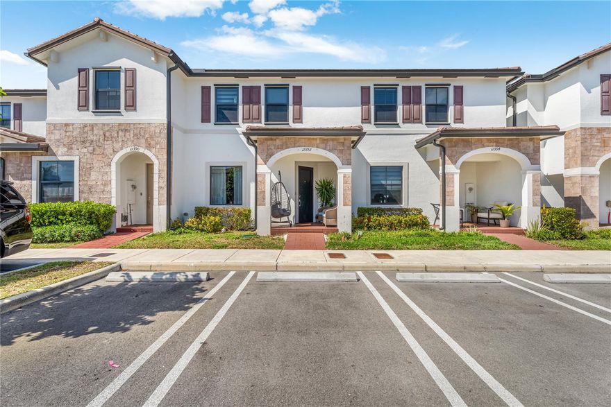 $10,000 TOWARD BUYER'S CLOSING COSTS AND PRICE IMPROVEMENT! MOTIVATED SELLER! Move-in-ready villa with all impact windows, located in a highly desirable community and in excellent condition throughout. The second floor features three spacious bedrooms and two full bathrooms, while the main level includes a convenient half bath for guests. Enjoy peace of mind in this gated community with 24/7 security, camera monitoring, and automated lighting. The association maintains common areas and has no pet restrictions. Residents enjoy two clubhouses, a sparkling community pool, and plenty of guest parking across the street. Conveniently located near top schools, I-75, Palmetto Expressway, and Florida's Turnpike with easy access to shopping and dining.