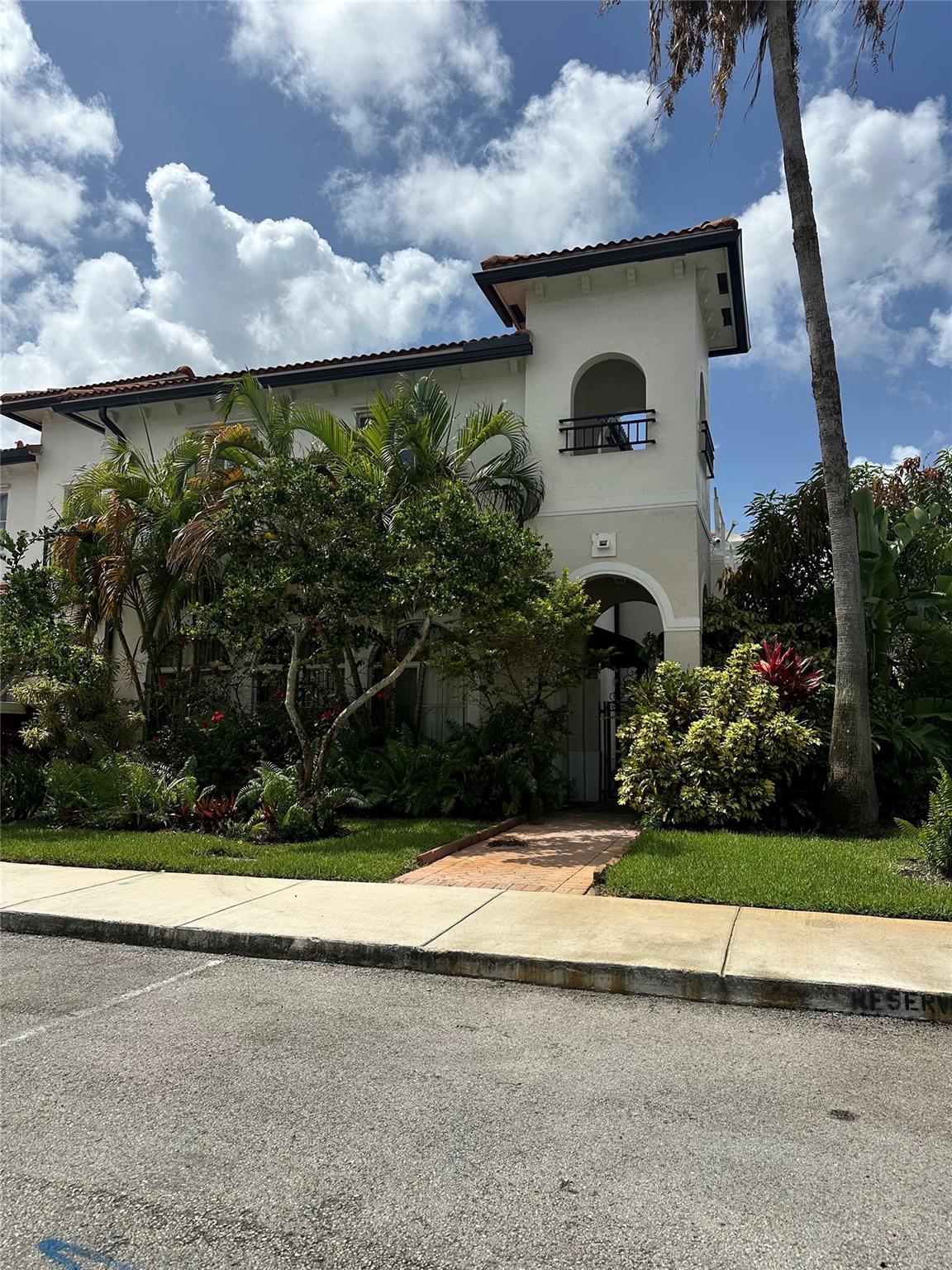 This beautiful 3/2.5 Townhome located in Lauderdale Lakes is looking for its 2nd owner. Private courtyard and 2 parking spaces in front of unit. Ample space for 2 living areas in this 1600+ square foot townhome. Enjoy BBQ or gardening in your large enclosed private courtyard in addition to a patio off a guest bedroom.