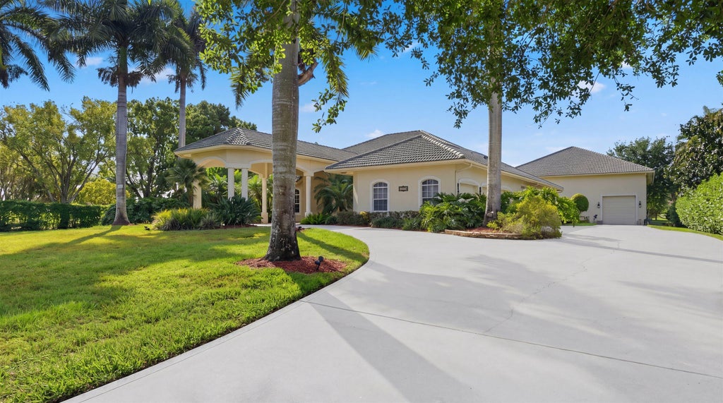 Photo of 15590 Lindbergh Lane, Wellington, FL 33414 (MLS # B26039277)