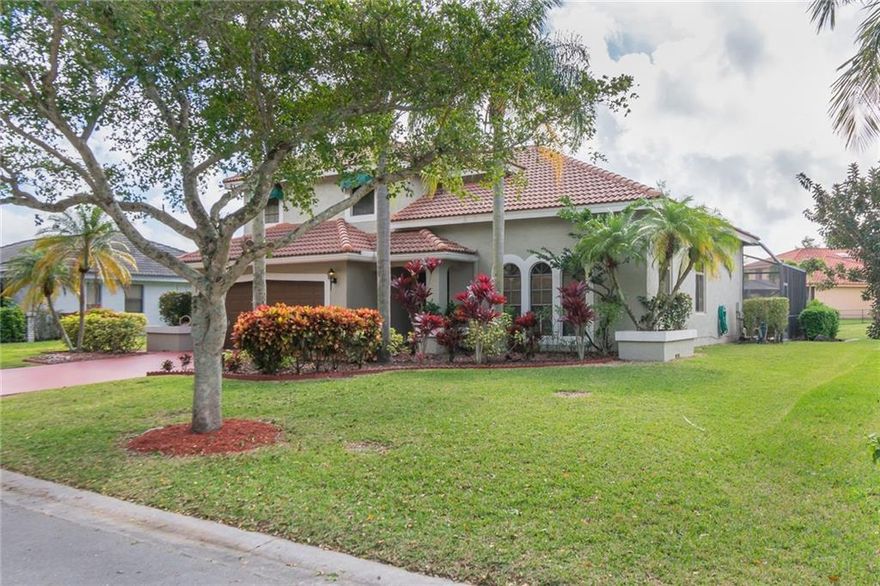 Spacious move-in ready 4 br, 3 full baths, 2 car garage, waterfront-pool home in the highly sought-after community of Hidden-Hammocks in N. Coral Springs, FL. Home features a pool with heated spa, brand new designer kitchen with granite countertops, new St/Steel appliances, upgraded bathrooms, wet bar, Master bedroom has large balcony overlooking canal. Home was recently painted in/out in 2018. Brand new A/C unit and water heater. New tile flooring throughout 1st floor installed March 2019. Walking distance to “A” Rated Park Springs Elementary and Forest Glenn Middle Schools, walk to (2) recreational parks with volleyball, basketball and tennis courts, new children play-swing areas with barbeque picnic stations! Centrally located to Sawgrass Expwy, FL Tpk. and shopping centers.