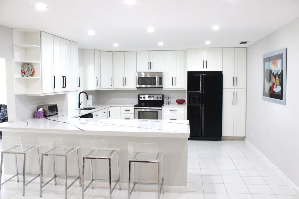 Photo of 6170 BRANDON Street, Palm Beach Gardens, FL 33418 (MLS # B26069093)