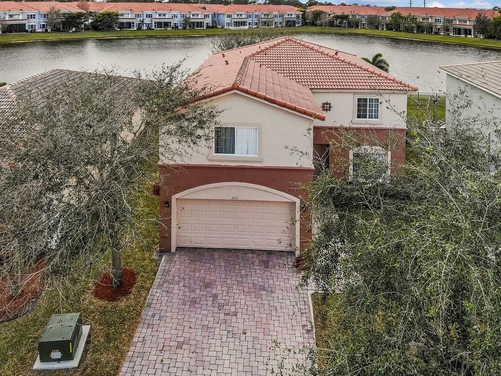 Photo of 2051 SW Newport Isles Boulevard, Port Saint Lucie, FL 34953 (MLS # R10690279)