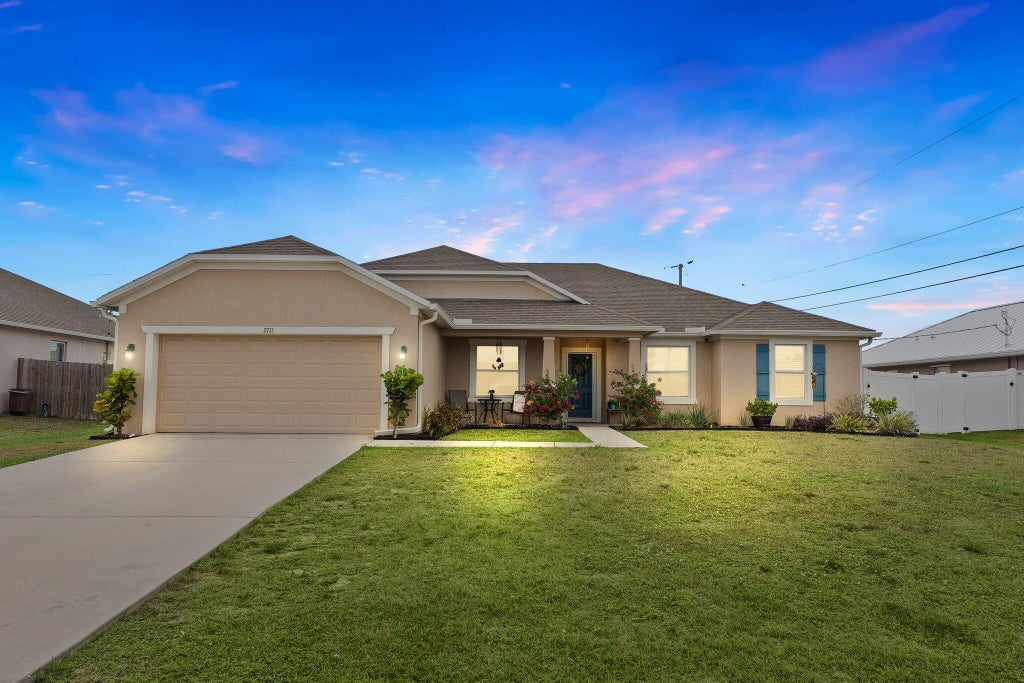 Photo of 2715 SW Hamilton Avenue, Port Saint Lucie, FL 34953 (MLS # R10995252)