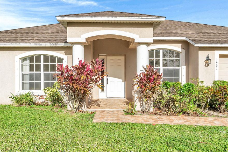 Bright, spacious home featuring vaulted ceilings, fresh paint, and an open layout perfect for modern living. The large living and dining areas flow into a generous family room with sliding doors to the screened patio and private backyard. The kitchen offers ample cabinets, bar seating, and a cozy breakfast nook. The split-bedroom design includes a roomy primary suite with a beautifully updated bath featuring a double vanity, soaking tub, walk-in shower, and an oversized closet. Move-in ready with tile in main areas and carpet in bedrooms—ideal for comfort and entertaining.