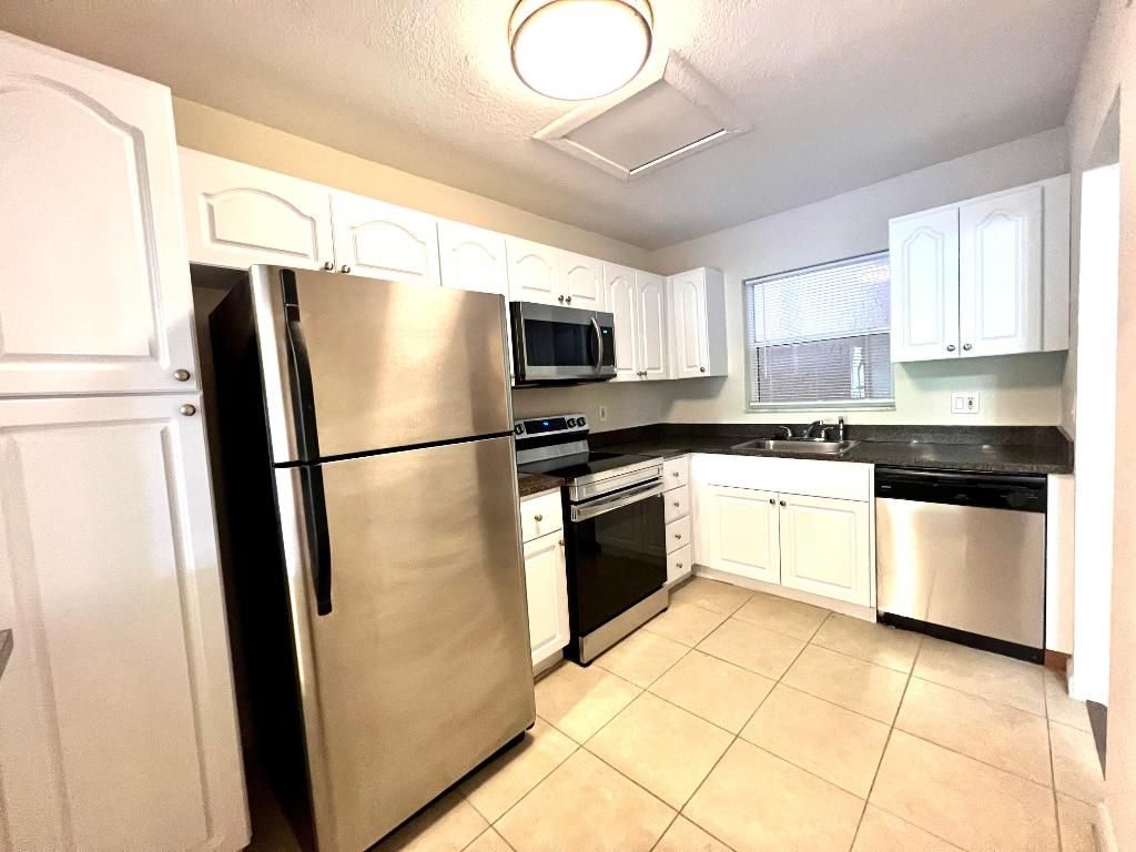 Photo of 120 Sparrow Drive #302, Royal Palm Beach, FL 33411 (MLS # R11152873)
