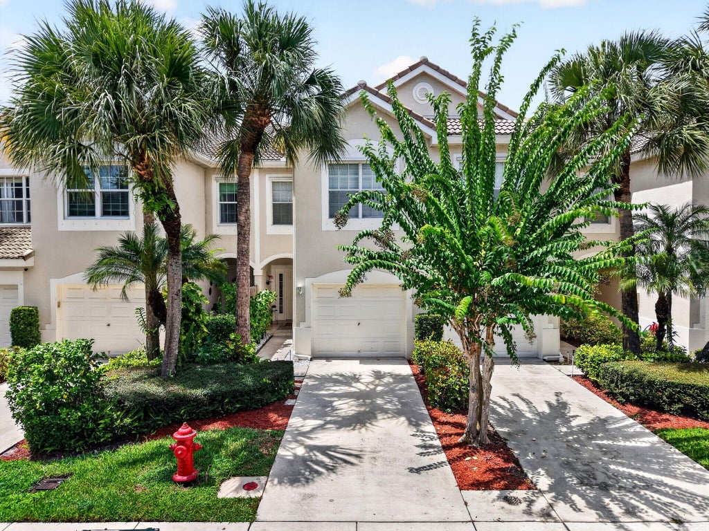 Photo of 1074 Woodfield Road, Greenacres, FL 33415 (MLS # B26075017)