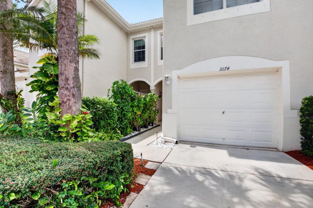 Photo of 1074 Woodfield Road, Greenacres, FL 33415 (MLS # B26075017)