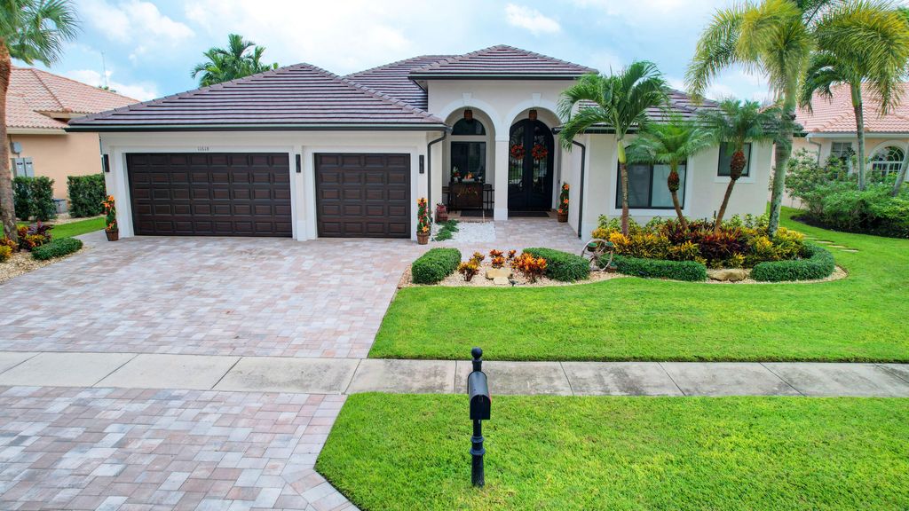 Photo of 11618 MANATEE BAY Lane, Wellington, FL 33449 (MLS # B26053796)