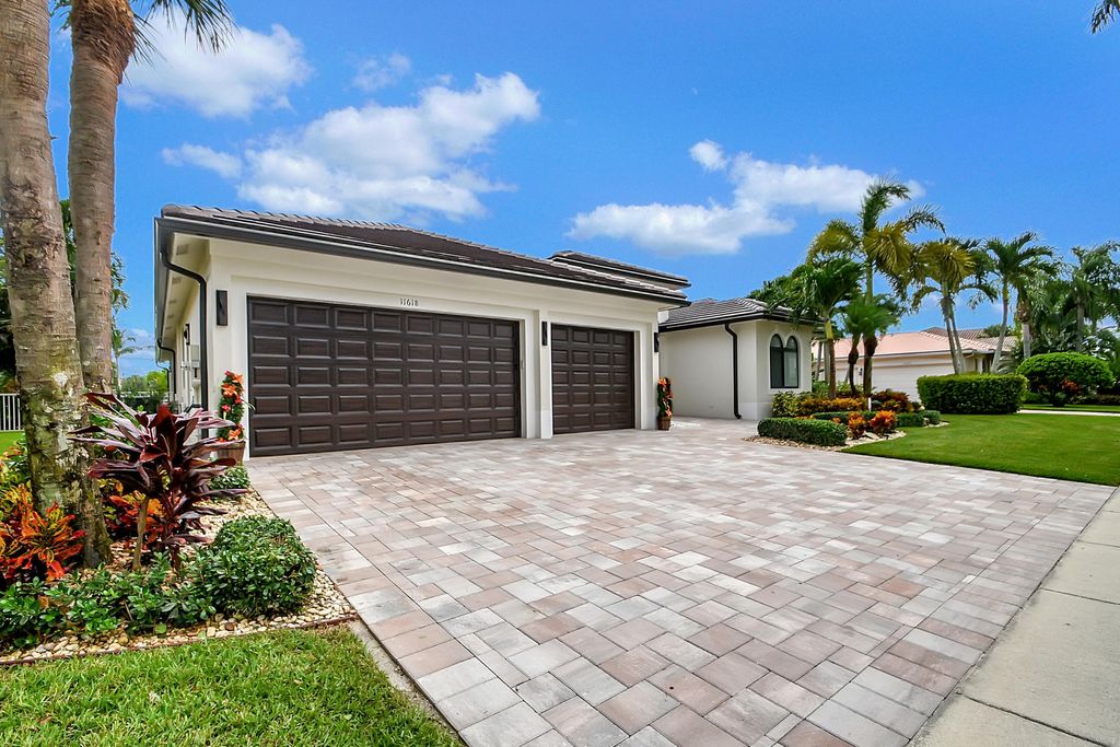 Photo of 11618 MANATEE BAY Lane, Wellington, FL 33449 (MLS # B26053796)
