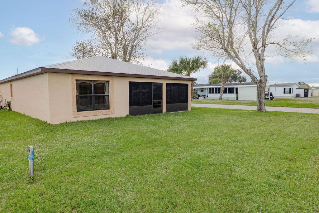 Photo of 13990 Cancun Avenue, Fort Pierce, FL 34951 (MLS # R10944163)