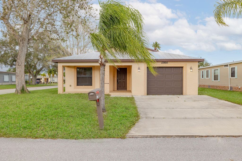 Photo of 13990 Cancun Avenue, Fort Pierce, FL 34951 (MLS # R10944163)