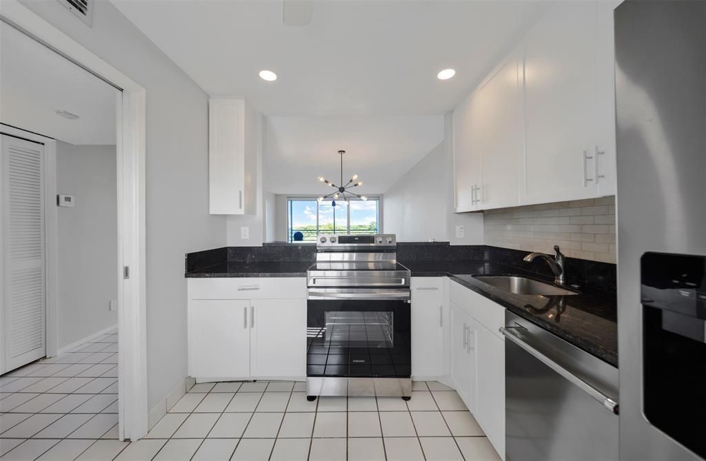 Photo of 605 Oaks Drive #704, Pompano Beach, FL 33069 (MLS # F10471941)