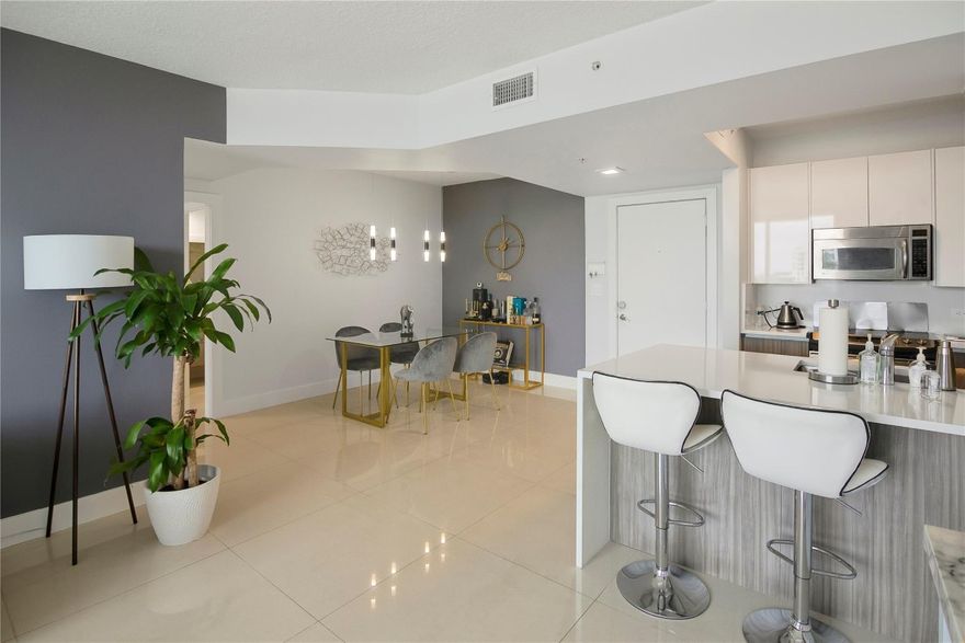 Just bring your toothbrush and move right in! This luxury, fully remodeled unit at the Venture in the heart of Aventura comes fully furnished with modern decor, TVs, and all essentials. A rare updated gem, it features a new kitchen, upgraded bathrooms, and newer tile floors. This is a true smart home: the entrance lock, light switches, Nest thermostat, and even the new washer/dryer are controlled from your phone. Every detail is new, including the AC vents, outlets, and switches. The prime location is walking distance to shops, dining, and the famous Aventura Mall. This building offers 4 pools, a gym, theater, and valet. Aventura is home to top schools like Aventura Charter K-8 and Don Soffer High. Can rent right away for 3 months minimum. High-end, turnkey living in the center of it all!