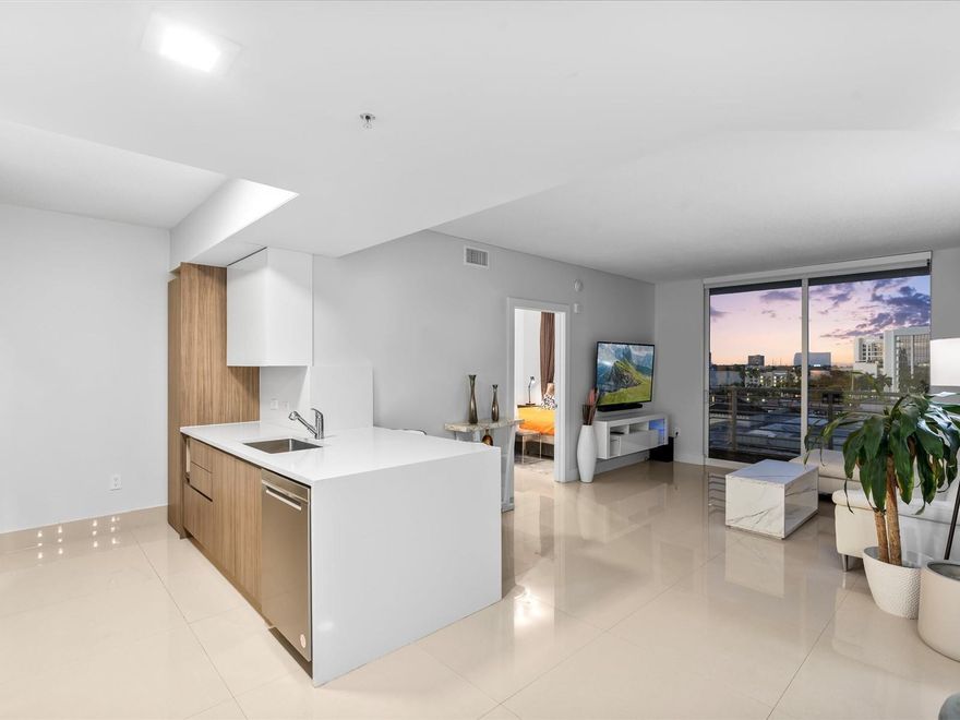 Building is approved for financing with 5% down! This luxury, fully remodeled unit at the Venture in the heart of Aventura comes fully furnished with modern decor, TVs, and all essentials. Just bring your toothbrush and move right in! A rare updated gem, it features a new kitchen, upgraded bathrooms, and newer tile floors. This is a true smart home: the entrance lock, light switches, Nest thermostat, and even the new washer/dryer are controlled from your phone. Every detail is new, including the AC vents, outlets, and switches. The prime location is walking distance to shops, dining, and the famous Aventura Mall. This building offers 4 pools, a gym, theater, and valet. Aventura is home to top schools like Aventura Charter K-8 and Don Soffer High. Can rent right away for 3 months minimum.