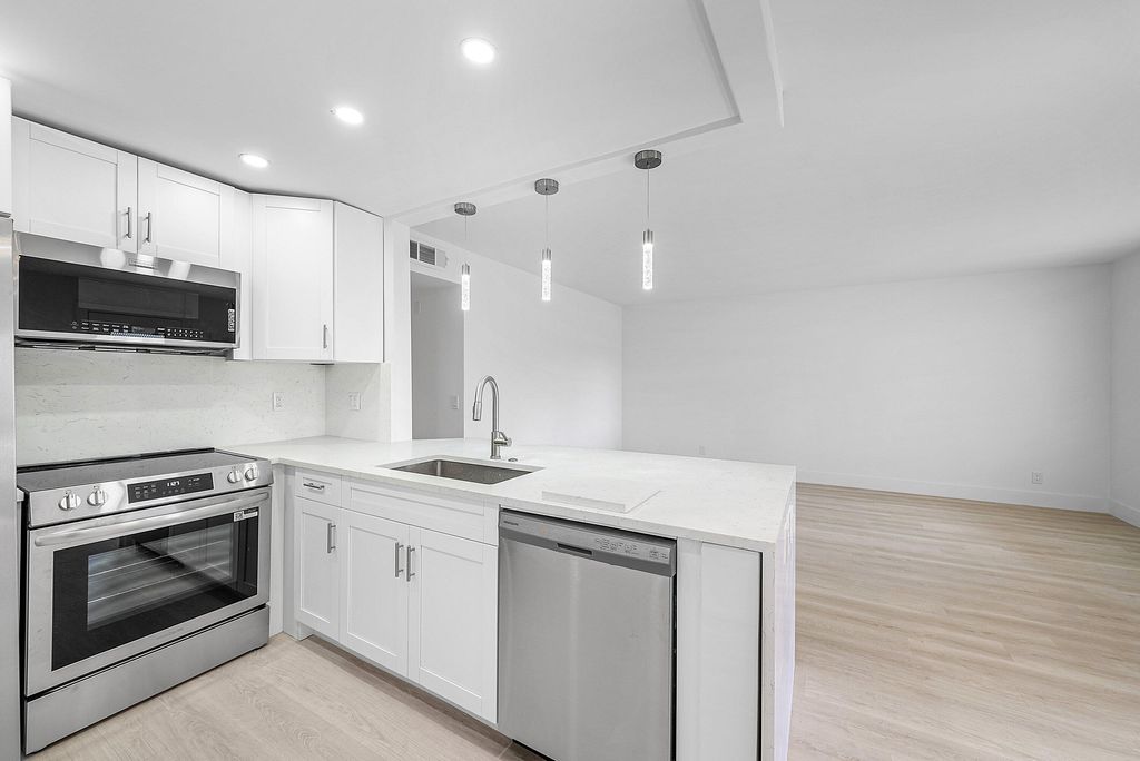 Photo of 15036 Ashland Lane #43, Delray Beach, FL 33484 (MLS # R11141836)