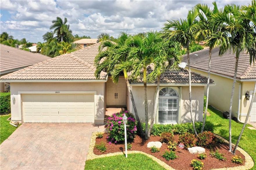 Don't miss one of the best homes in Coral Springs. This 3/2 pool home on water in a gated community is designer decorated and lovingly maintained. Home features new landscaping, accordion shutters on all windows, stainless steel appliances, high efficiency A/C, designer window treatments including plantation shutters. All closets have built-ins. Master bedroom has 2 closets, 1 is a walk-in with built-in safe. Both bathrooms are totally remodeled, master bath with shower and Jacuzzi tub. 3rd bedroom can be office with built in double desk, bookshelves and storage. Low HOA. Close to shopping, A rated schools, and easy access to highways.