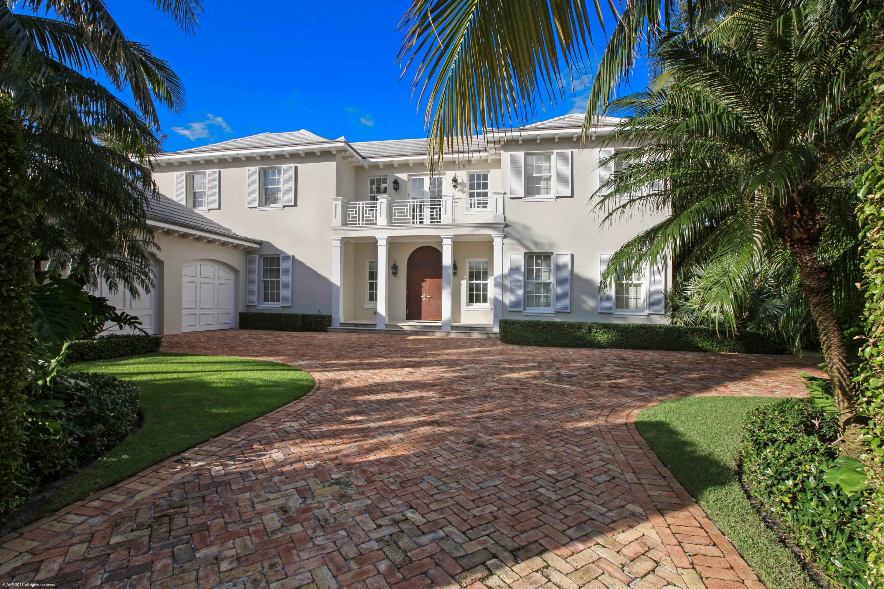 This Island Colonial home is the envy of the neighborhood. Constructed with the finest materials and craftsmanship, this home exudes graceful elegance. Beautifully proportioned, the formal living room sets the tone for the home with a marble fireplace, a beautiful beamed ceiling and French doors to the patio. Designed for easy entertaining, the gorgeous kitchen features both a full-sized refrigerator and freezer, a six burner Wolf oven, a grand center island with breakfast seating, a convenient Butler's pantry and adjacent laundry room. A downstairs guest suite ensures privacy for all. Double French doors from the Family room lead out to the patio and pool. The private, lushly landscaped backyard provides the perfect venue for outdoor entertaining.