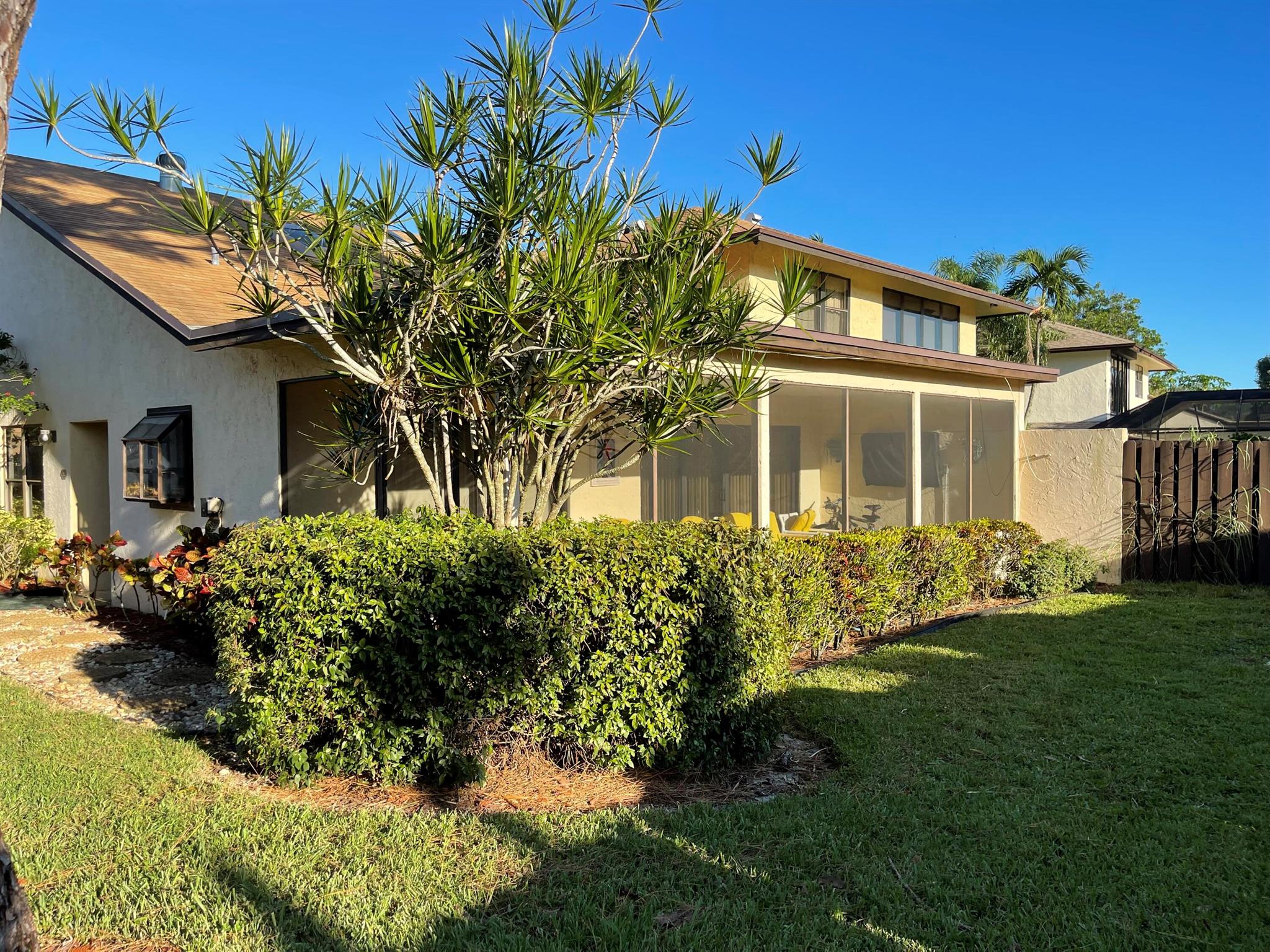 SEASONAL RENTAL with ALL UTILITIES INCLUDED.. Fully Furnished and Turn key 2-bedroom, 2-bath villa in Delray Beach with an attached 1-car garage. Enjoy a large, private fenced yard in the welcoming Woodlake community, just steps from the pool, tennis, basketball, pickle ball courts, clubhouse, and gym! This spacious, single-story home features an updated, open-concept layout with an eat-in kitchen. Relax or entertain on the oversized, screened-in covered lanai. The generous master suite includes an en-suite bath. Includes private washer and dryer. Minutes from the beach and Atlantic Avenue's dining and entertainment. Just a short walk to Delray Beach Donald Ross Public Golf Club and easy access to I-95 and the Turnpike. All ages welcome!