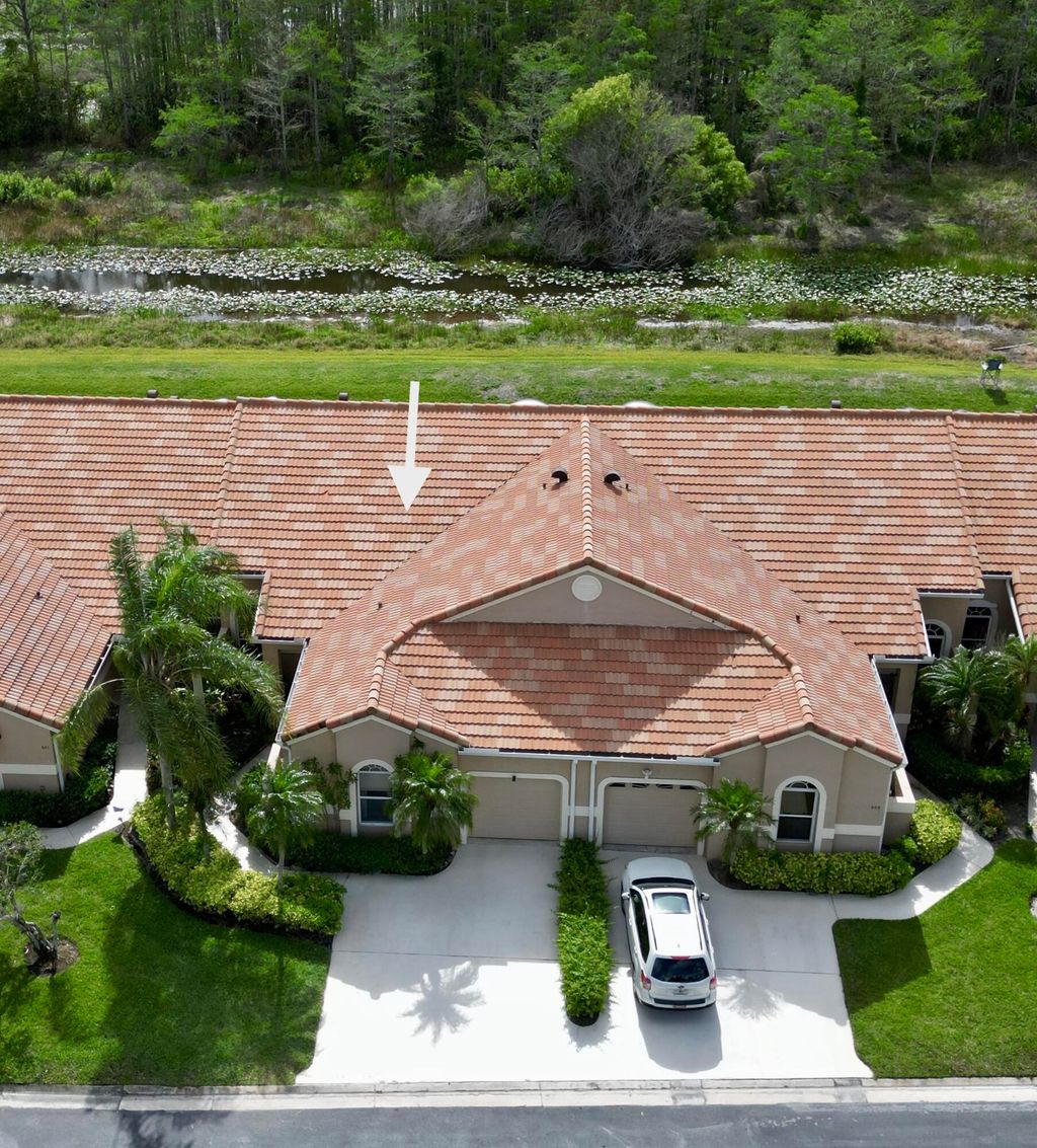 Photo of 602 Sabal Palm Lane, Palm Beach Gardens, FL 33418 (MLS # B26012480)