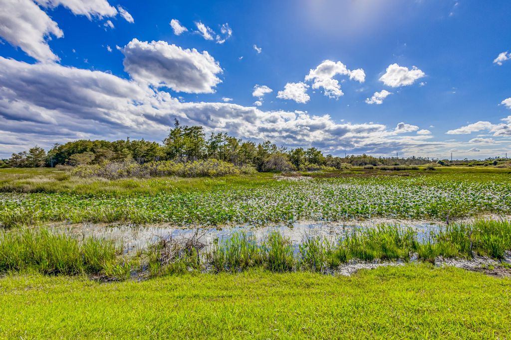 Photo of 602 Sabal Palm Lane, Palm Beach Gardens, FL 33418 (MLS # B26012480)