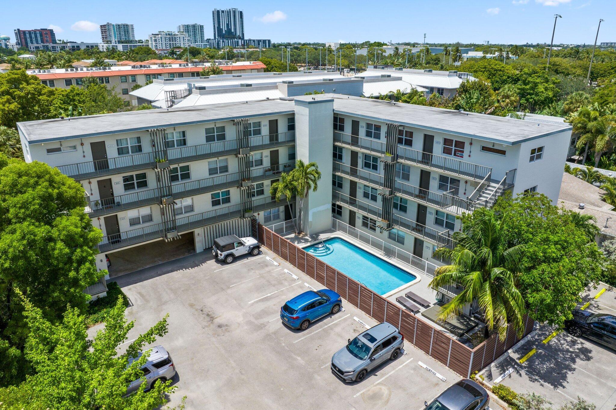 This beautifully maintained first-floor unit is located in the highly desirable Victoria Park neighborhood. The home features a bright white kitchen with stainless steel appliances, a spacious primary bedroom with a walk-in closet, and hurricane-impact windows, doors, and sliders throughout for added peace of mind. Recent updates include a new AC (2021) and water heater (2020).Step through the sliding doors into your own private backyard--perfect for relaxing or entertaining. Just steps from your front door, enjoy the community pool and other great amenities including a secure keypad-entry gate, community laundry facilities, and pet-friendly living.Don't miss this opportunity--schedule your showing today!