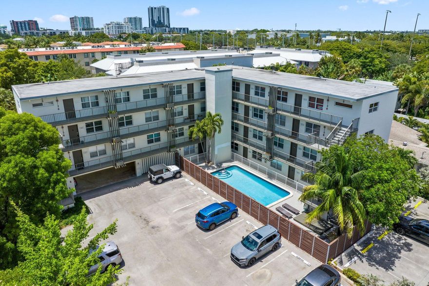 This beautifully maintained first-floor unit is located in the highly desirable Victoria Park neighborhood. The home features a bright white kitchen with stainless steel appliances, a spacious primary bedroom with a walk-in closet, and hurricane-impact windows, doors, and sliders throughout for added peace of mind. Recent updates include a new AC (2021) and water heater (2020).Step through the sliding doors into your own private backyard--perfect for relaxing or entertaining. Just steps from your front door, enjoy the community pool and other great amenities including a secure keypad-entry gate, community laundry facilities, and pet-friendly living.Don't miss this opportunity--schedule your showing today!