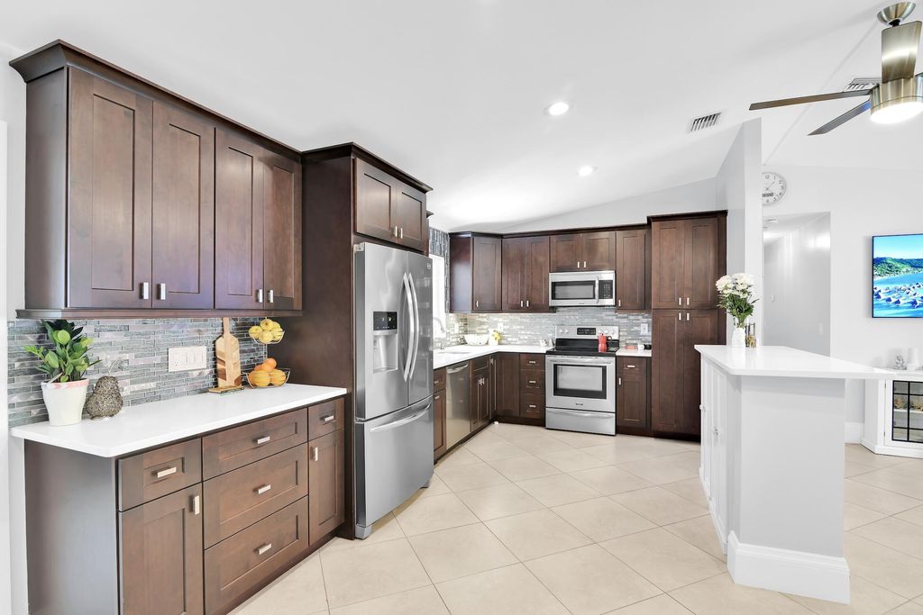 Photo of 432 SW Natura Avenue, Deerfield Beach, FL 33441 (MLS # B26023729)