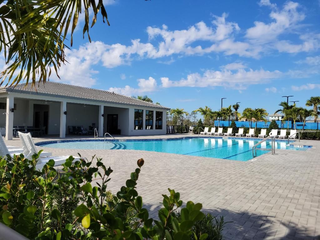 Photo of 2133 SE Mosaic Boulevard, Port Saint Lucie, FL 34984 (MLS # R11158684)