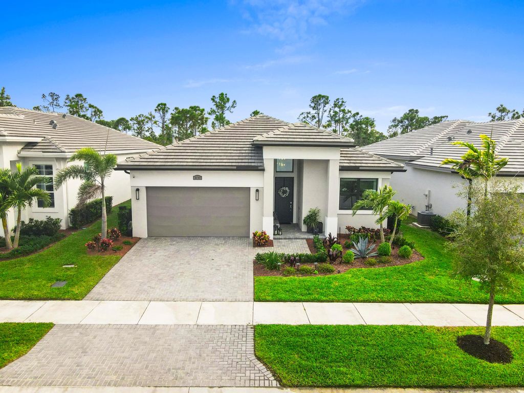 Photo of 2133 SE Mosaic Boulevard, Port Saint Lucie, FL 34984 (MLS # R11158684)