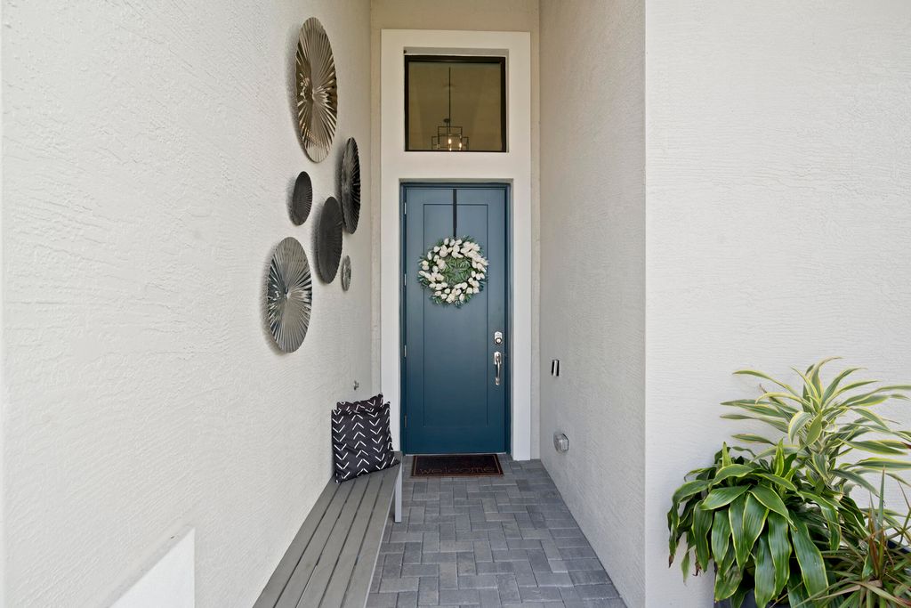 Photo of 2133 SE Mosaic Boulevard, Port Saint Lucie, FL 34984 (MLS # R11158684)