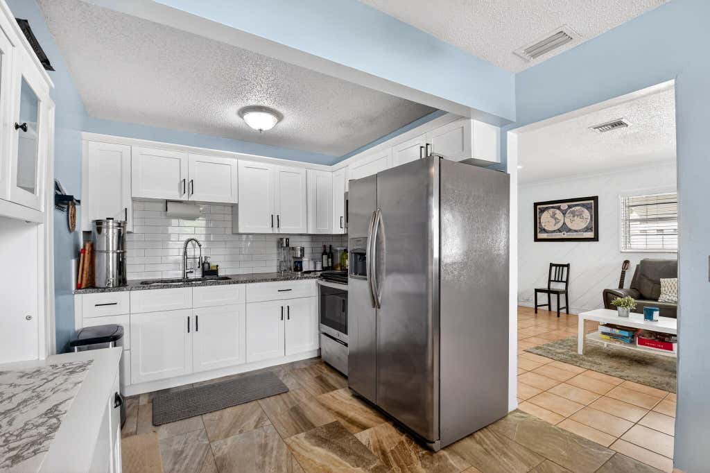 Photo of 5721 Coconut Road, West Palm Beach, FL 33413 (MLS # B26010876)