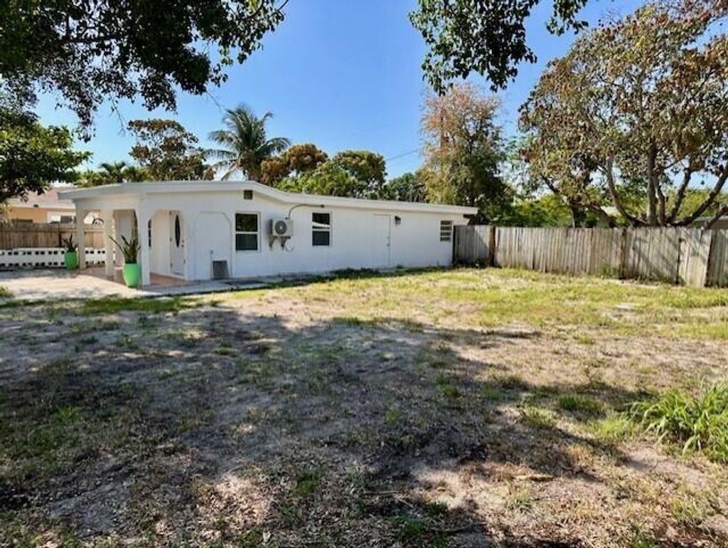 Photo of 1134 Peak Road, Lake Worth, FL 33462 (MLS # R11096363)
