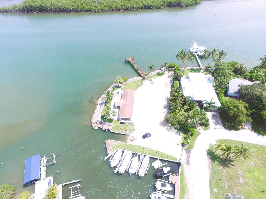 Photo of 5695 SE Matousek Street, Stuart, FL 34997 (MLS # R10932203)