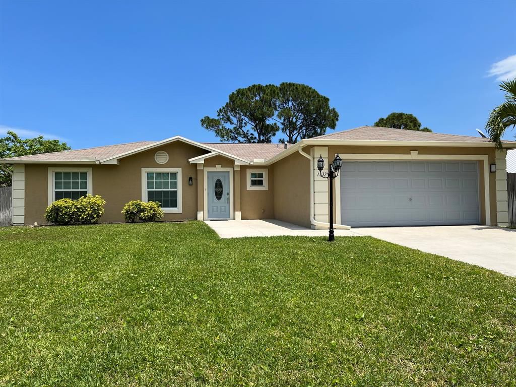 Photo of 1337 SE Naples Lane Ln, Port St Lucie, FL 34983 (MLS # R10801489)