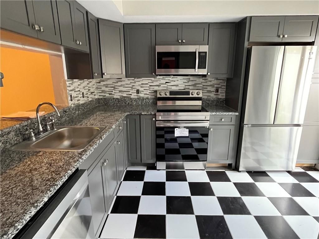 Photo of 3069 N Palm Aire Dr #3069, Pompano Beach, FL 33069 (MLS # F10326490)