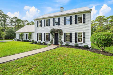 Photo of 4600 SW COUNTRY Place, Palm City, FL 34990 (MLS # B26060526)
