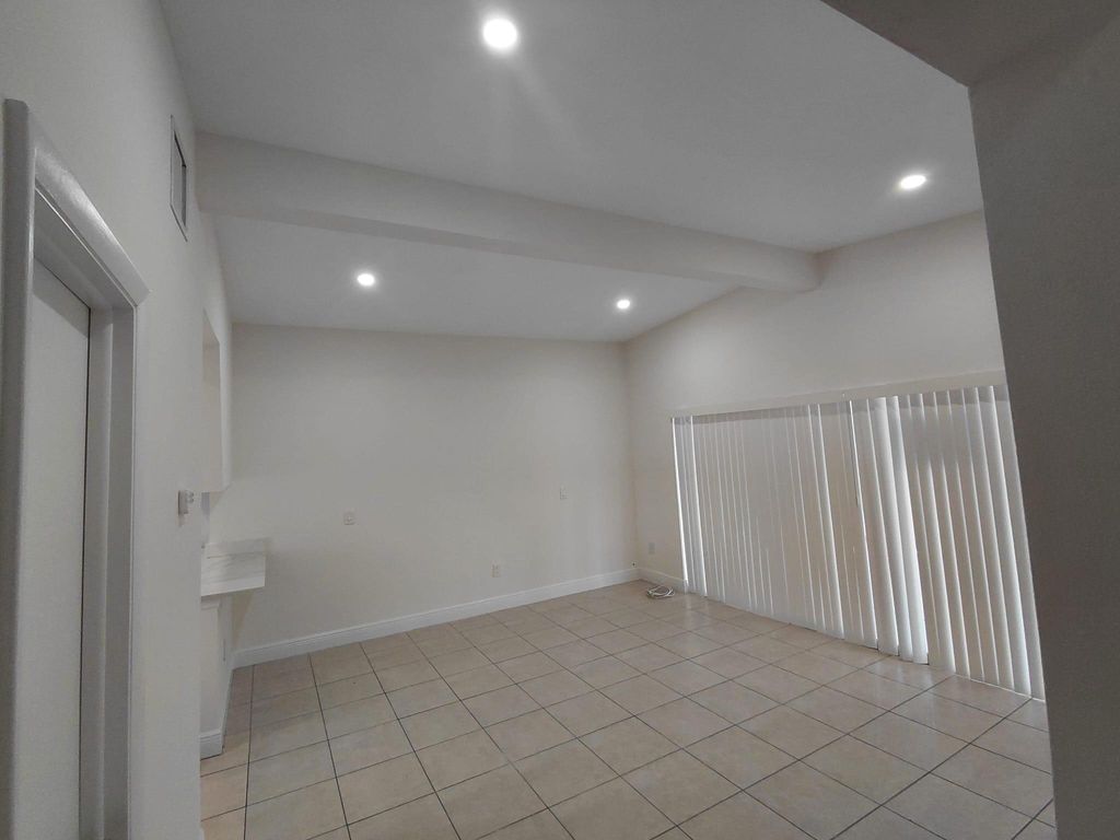 Photo of 116 NE Prima Vista Boulevard #A, Port Saint Lucie, FL 34983 (MLS # B26023673)