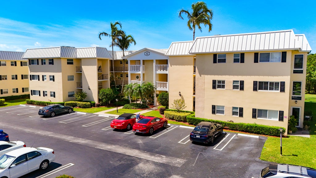 Photo of 12 Colonial Club Drive #202, Boynton Beach, FL 33435 (MLS # B26040768)