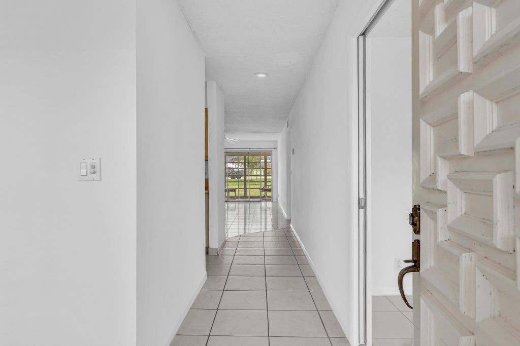 Photo of 13721 FLORA Place #D, Delray Beach, FL 33484 (MLS # B26073264)