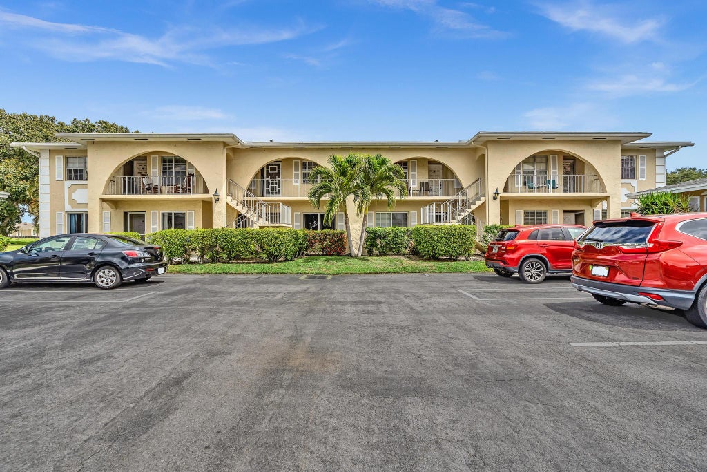 Photo of 13721 FLORA Place #D, Delray Beach, FL 33484 (MLS # B26073264)