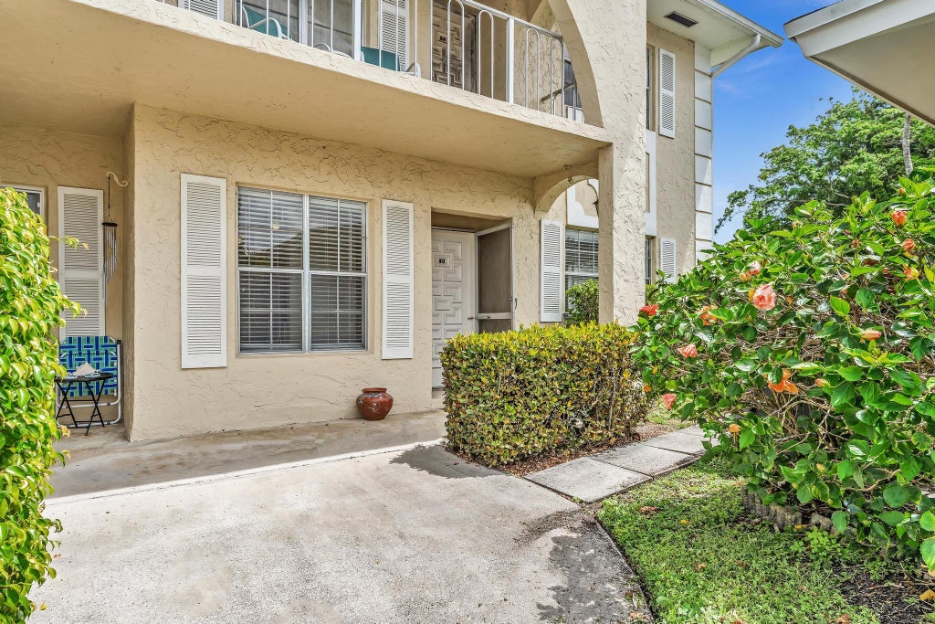 Photo of 13721 FLORA Place #D, Delray Beach, FL 33484 (MLS # B26073264)