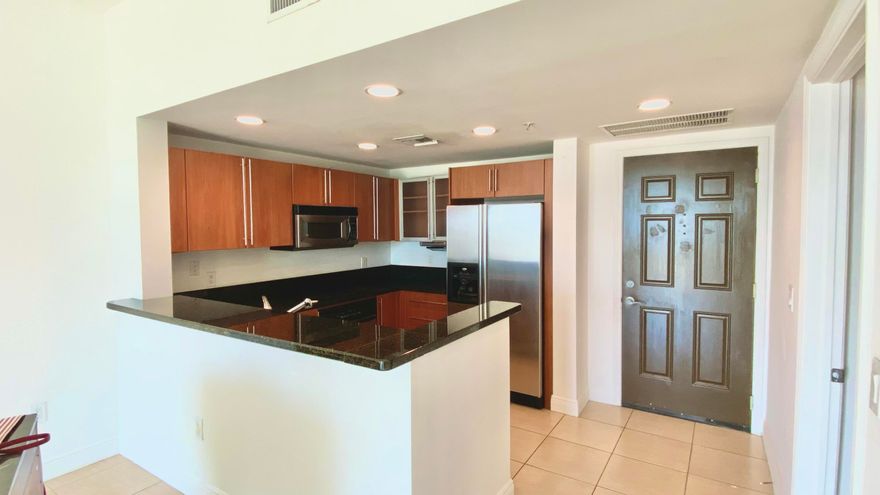 Full Service luxury PENTHOUSE 2BR/2BA on the 8th floor at 610 Clematis Street in the heart of downtown West Palm Beach. This unit features a modern kitchen with granite countertops and stainless steel appliances, flowing into a spacious living area with high floor-to-ceiling sliding doors that lead to a private balcony with city views.   Split-bedroom layout for added privacy.   Pool, Fitness Center, Sauna, Zen Garden with 2 Grills, Garage, 24/7 Front Desk Attendant. Steps to City Place, Intracoastal, Shopping, Fine Dining, Kravis Center, Convention Center, Brightline, The Green Market and Publix. Minutes to Palm Beach Island, Beach, Airport. Perfect for those looking to live in the center of downtown.   Newer AC and water heater.   TWO (2) UNDERGROUND Parking Spaces