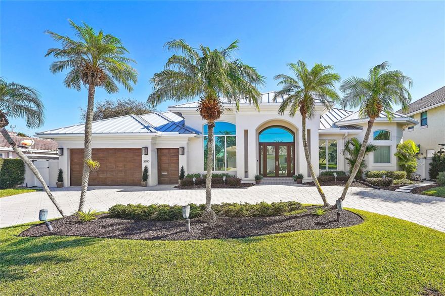 MODERN NEWLY RENOVATED WATERFRONT ESTATE IN LIGHTHOUSE POINT.90 FEET OF DEEP WATER (NO FIXED BRIDGES)& 5 MINS ON WATER TO INLET. ENTERTAIN OUTDOOR W/ STONE OUTDOOR KITCHEN, BAR, PERGOLA, STONE POOL DECKING, POOL, WATERFALL SPA, & NEW DOCK. INTERIOR OF THIS NEWER CONSTRUCTION 3 BED, 3.5 BATH PLUS OFFICE RANCH FEATURES 15.5' HIGH CEILINGS, EXPANSIVE WINDOWS, WOOD BURNING CORAL FIREPLACE, NEW AC, 2.5 CAR GARAGE, BONUS ROOM, LAUNDRY & PANTRY. SPLIT FLOOR PLAN PRIMARY SUITE BOASTS 2 WALK-IN CLOSETS, STONE SHOWER, 2 VANITIES & SOAKER TUB. THE HEART OF THIS OPEN FLOOR PLAN TURN-KEY HOME FEATURES A BRAND-NEW CHEF'S KITCHEN BY LICENSED INTERIOR DESIGNER, VIKING APPLIANCES, DOUBLE OVENS, 72" REFRIGERATION CENTER, COUNTER SEATING, & 2 OVERSIZED STONE ISLANDS. NEW ROOF IN 2019. NEW IMPACT WINDOWS 2020