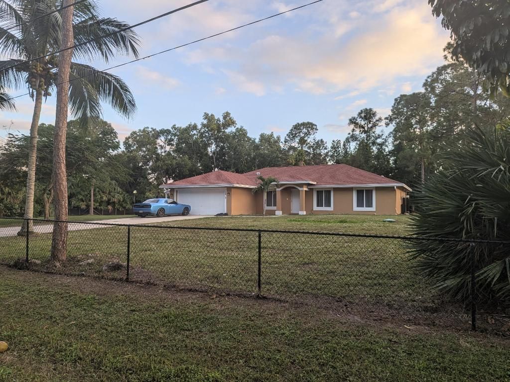 Photo of 12810 57th Road N, The Acreage, FL 33411 (MLS # R11144321)