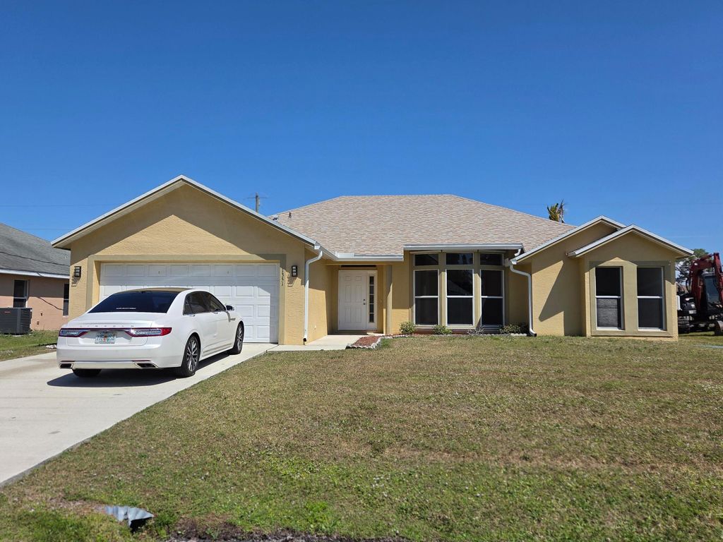 Photo of 1351 SE Ladner Street, Port Saint Lucie, FL 34983 (MLS # R11075695)